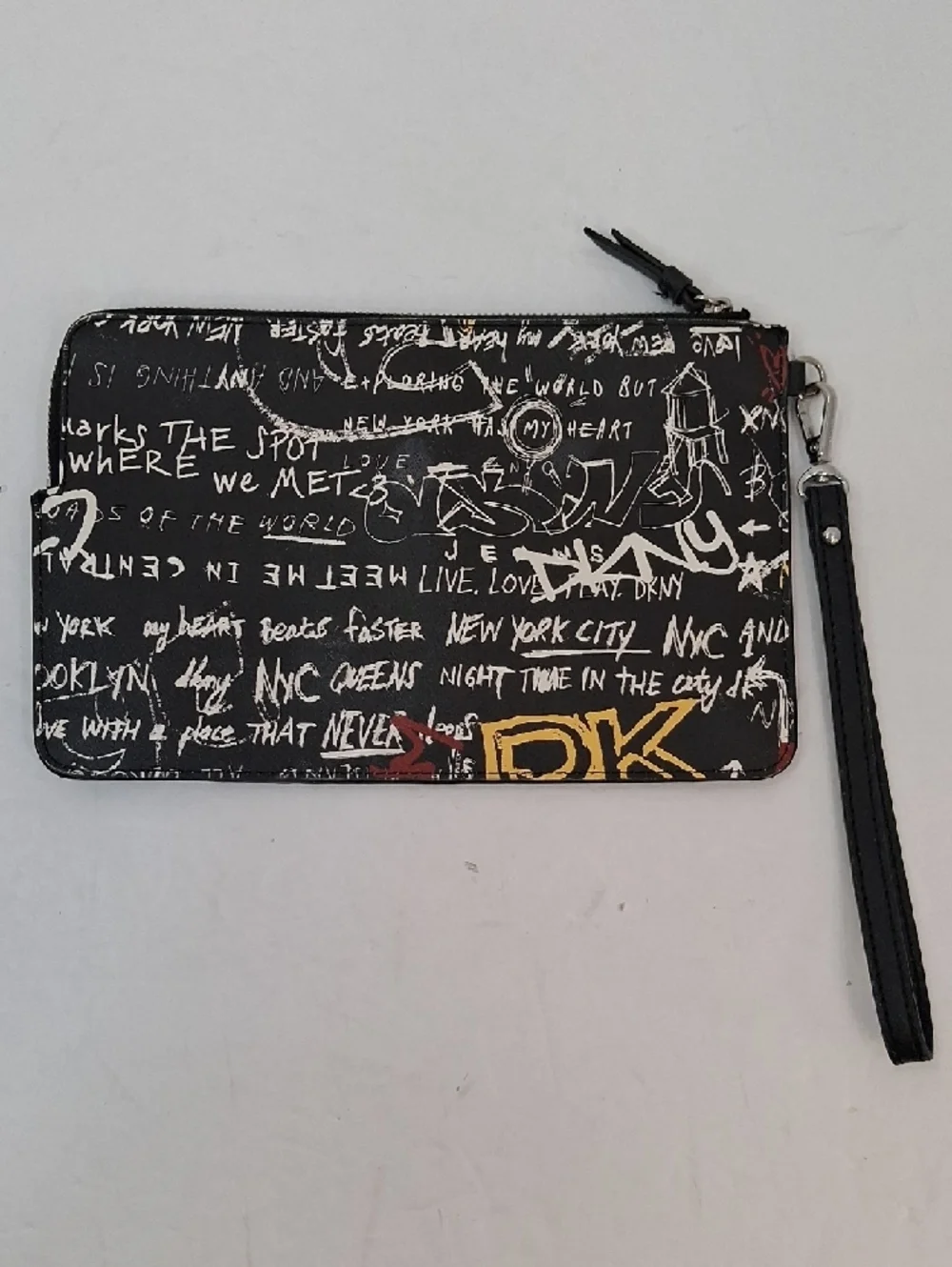 DKNY Black Wristlet with Teal & Red Logo and Yellow Accents